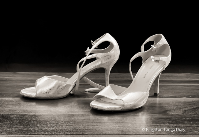 A pair of silver woman tango dancing shoes